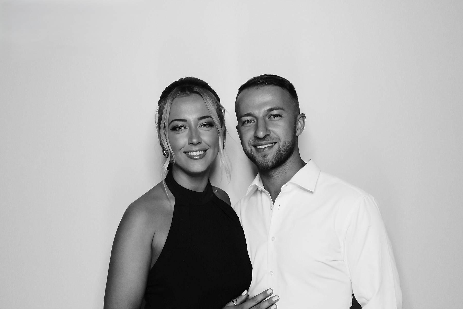 Happy Couple at a Wedding Photo Booth